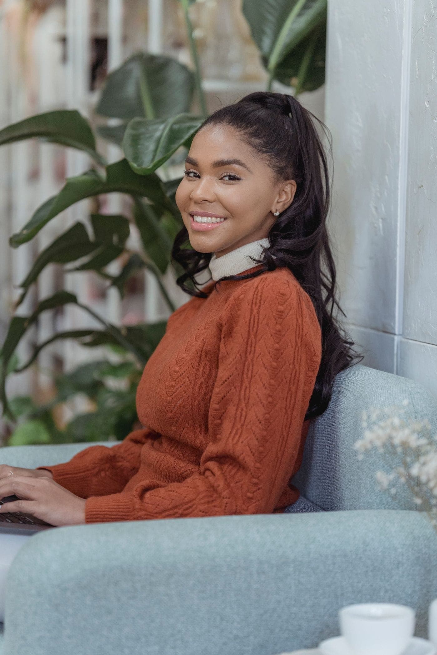 Maria, a licensed CoverageCo agent, at her desk